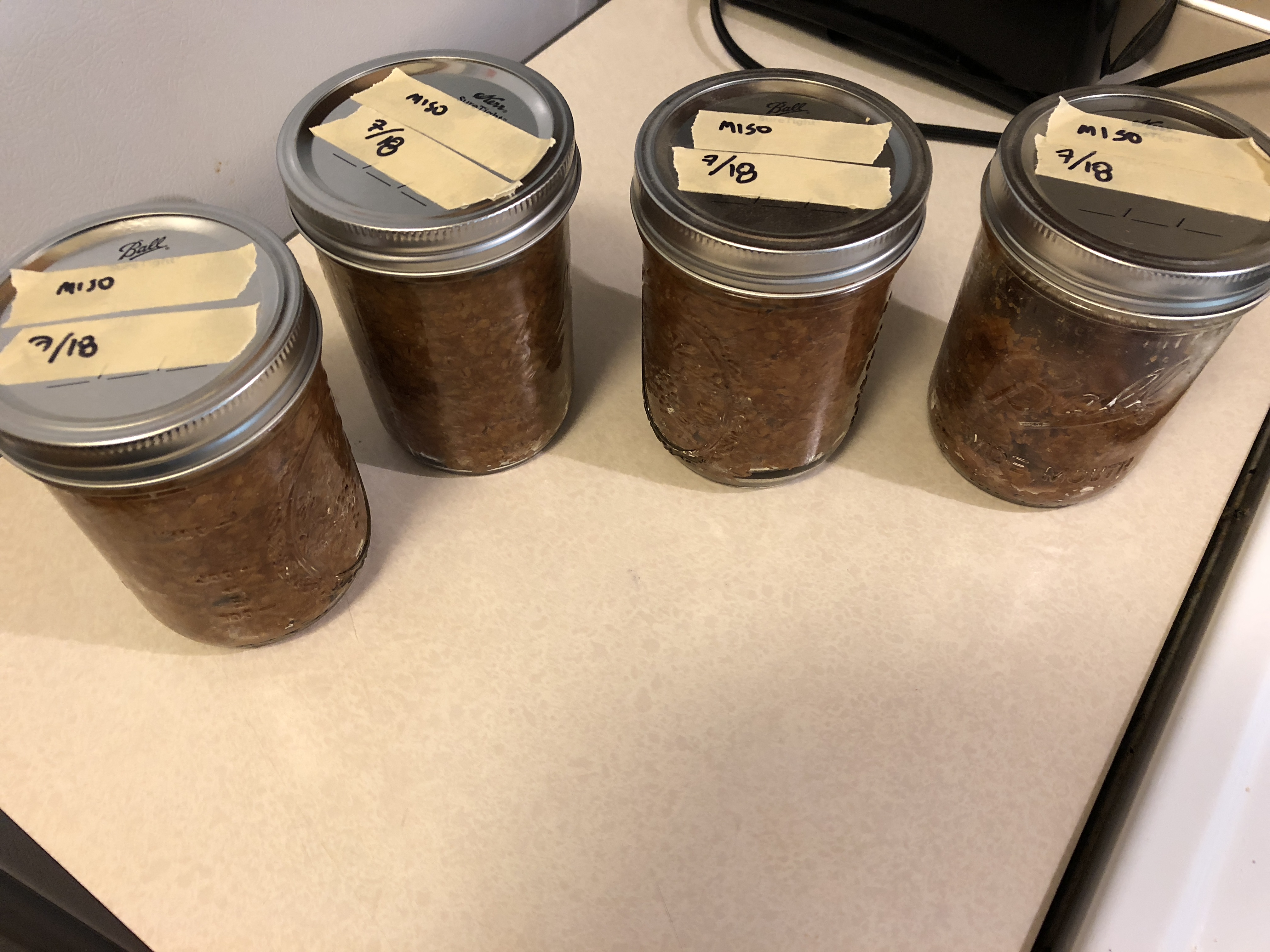 Miso packed into storage jars.